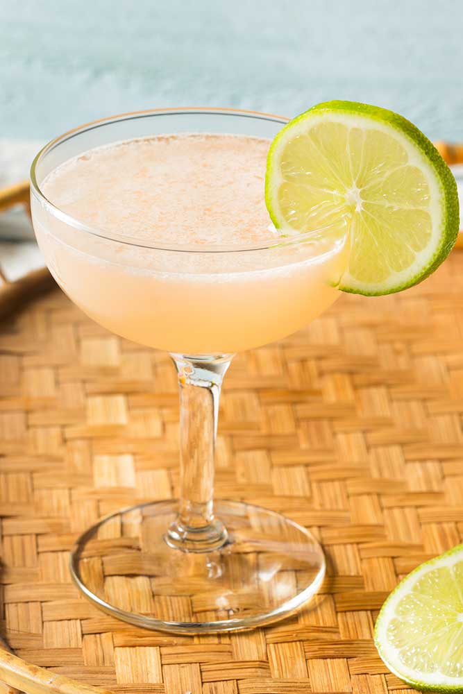 shutterstock_1772989538_web cocktail with limes